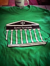 Lyceum T Shirt 2013 - Green with the Previous Iowa Philosophy Lyceum Logo